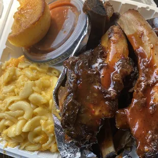 Beef Ribs, Mac and cheese, baked beans, and cornbread muffin.