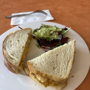 Breakfast Sandwich w/ sausage and cheddar.