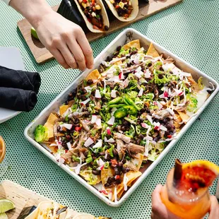 Shareable sheet pan duck confit nachos