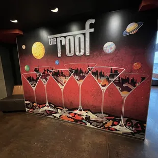 a wall mural of martini glasses