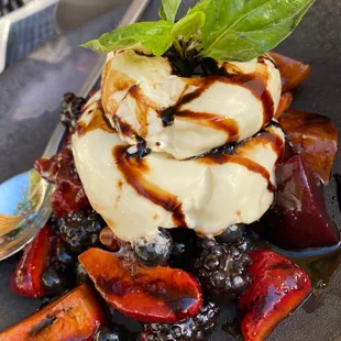 Some kinda mixed fruit with a cheese thing and balsamic drizzle IG: @ammysalamii