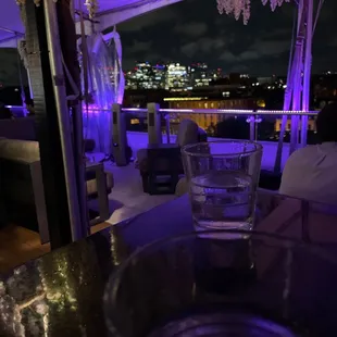 a glass of water on a table