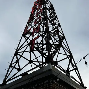 the top of a tower with a clock on it