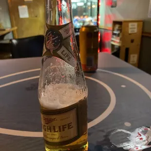 a bottle of beer on a table