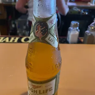 a bottle of beer on a table