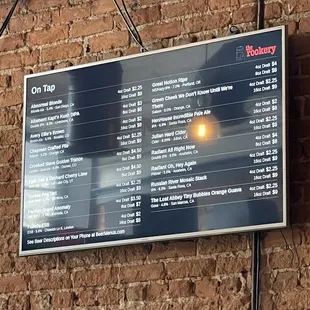 Beer menu displayed on the wall