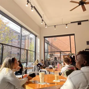 a group of people sitting at a table