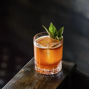BUCK TO THE FUTURE rye whiskey, manzanilla sherry, strawberry-basil purée, nardini amaro, ginger syrup, lemon, barrel smoked black pepper