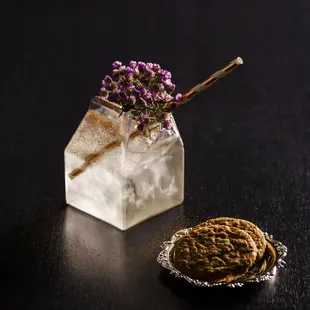 MILK PUNCH dark rum, pisco, bonded bourbon, cognac, batavia arrack, absinthe, peychaud's bitters, milk whey, pineapple, chai tea, spices