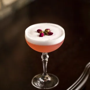 CLOVER CLUB citadelle gin, dolin dry vermouth, raspberry syrup, lemon, lychee, egg white, rose buds