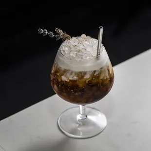 BLACK MOUNTAIN COFFEE irish whiskey, amaro montenegro, walnut liqueur, banana liqueur, demerara, cold brew coffee, salted cinnamon cream