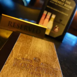 a wooden table with a book on it