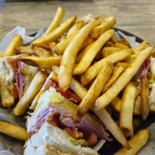 There&apos;s a fresh, excellent Club Sandwich underneath all those well-cooked fries and a solid deal @ $10.59!