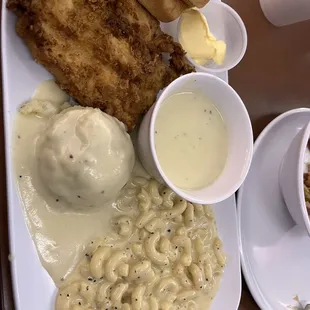 Chicken plate with Mac and cheese and mash potatoes