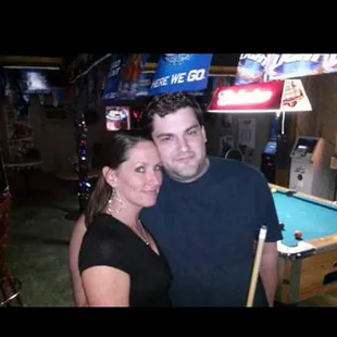 a man and a woman posing for a picture