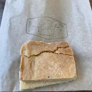 a piece of bread on a piece of paper