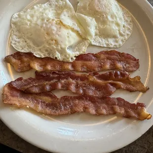 Eggs over medium with bacon