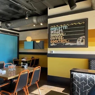 a table and chairs in a restaurant