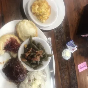 Meatloaf with garlic mashed potatoes, green bean, corn casserole and biscuit plus scratch made chocolate cake.