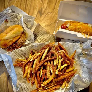 Lake Girl Burger (with an onion ring, provolone cheese and BBQ sauce), the Angus Premium Chili Dog, and crispy hand cut fries.