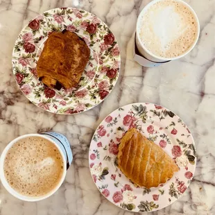 Chocolate croissant, cafe au lait, apple turnover, Irish cream latte