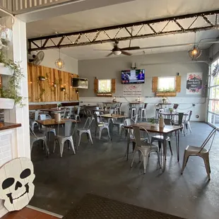 a restaurant with tables and chairs