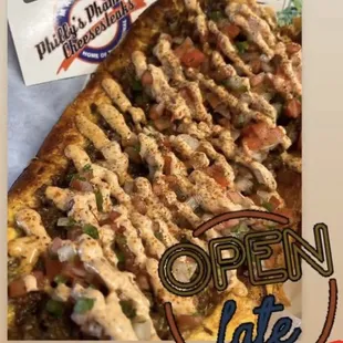 an open sign for a pizza