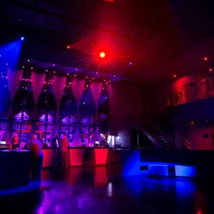 a stage with red and blue lights