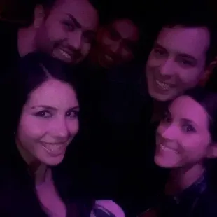 a group of people posing for a picture