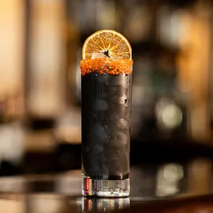 a drink with a slice of orange