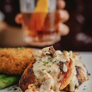 Savor the moment with boudin-stuffed chicken perfection, an old-fashioned sip, and a loaded potato cake. Pure comfort on this beautiful day!