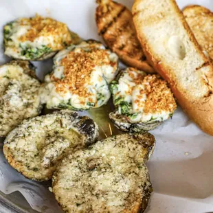 Savor the irresistible flavors of our signature chargrilled oysters!