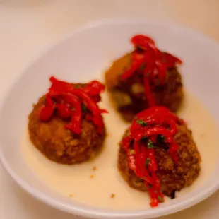 Corn Chorizo Croquettes in a manchego fondue