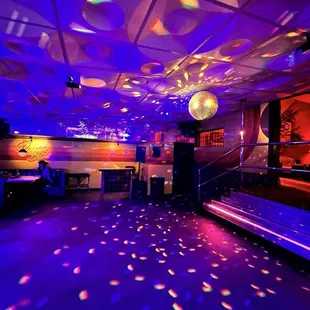 Dance and drink and be merry in the back bar.