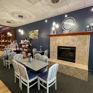 a dining room with a fireplace