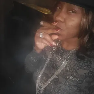 a woman smoking a cigarette