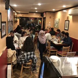 a group of people sitting at a table