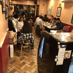 people sitting at tables