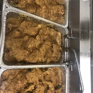 three pans of food