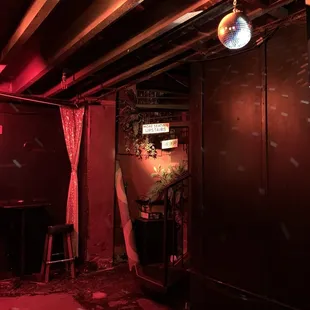 a bar with red lighting