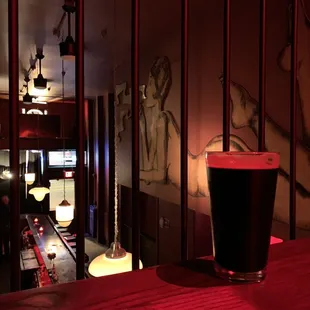 a pint of beer on the bar