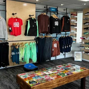 Men's apparel at The Running Well Store in Martin City