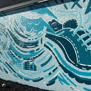 "Soaring Through KC" a mural by Stevie Hues