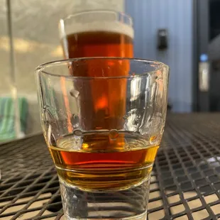 a glass of beer on a table