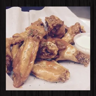 a plate of chicken wings