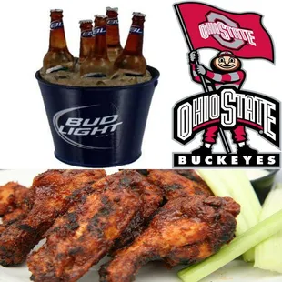 a plate of chicken wings, celery, and a bucket of beer