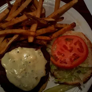 a burger and fries on a plate