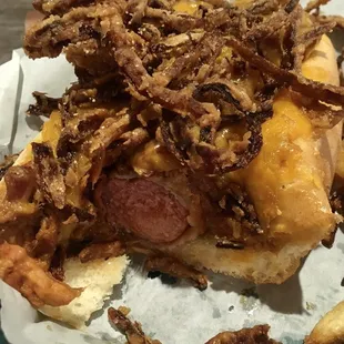 100% beef, wrapped in bacon, deep fried, covered with bbq pork, cheese and crispy fried onions with fresh cut fries....uh...may....ZING!!!