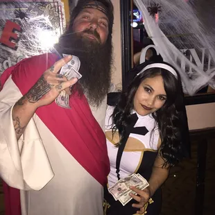 a man and a woman dressed in costumes