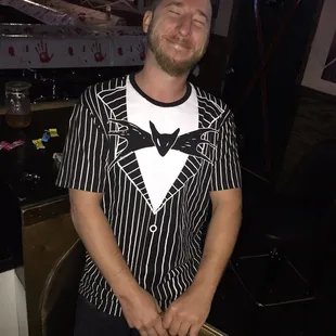 a man in a black and white shirt